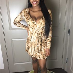 Mini wrap style dress.